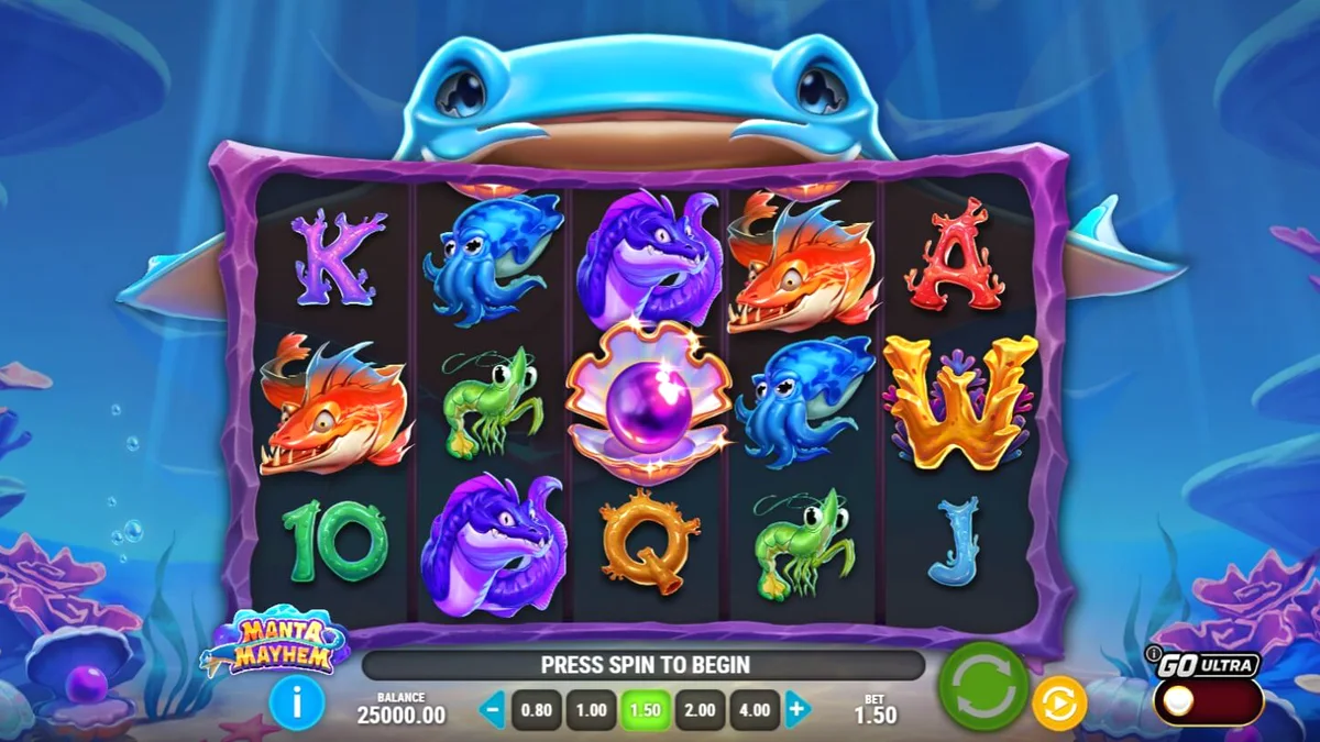 Isang makulay na underwater scene mula sa Manta Mayhem slot na nagpapakita ng coral reef at manta ray.